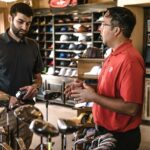A business team analyzing customer feedback to identify pain points and improve customer experience.
