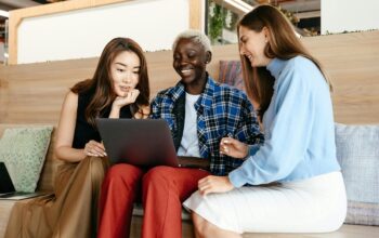 Smiling person chatting over coffee, symbolizing friendly brand communication
